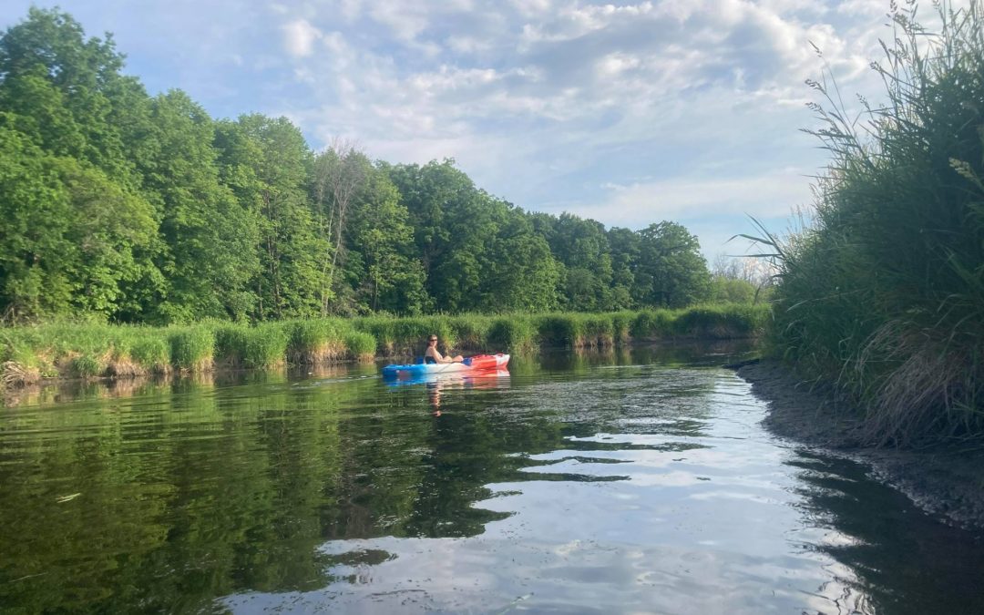 An image of me kayaking to represent my passion for wellness and being active in nature.